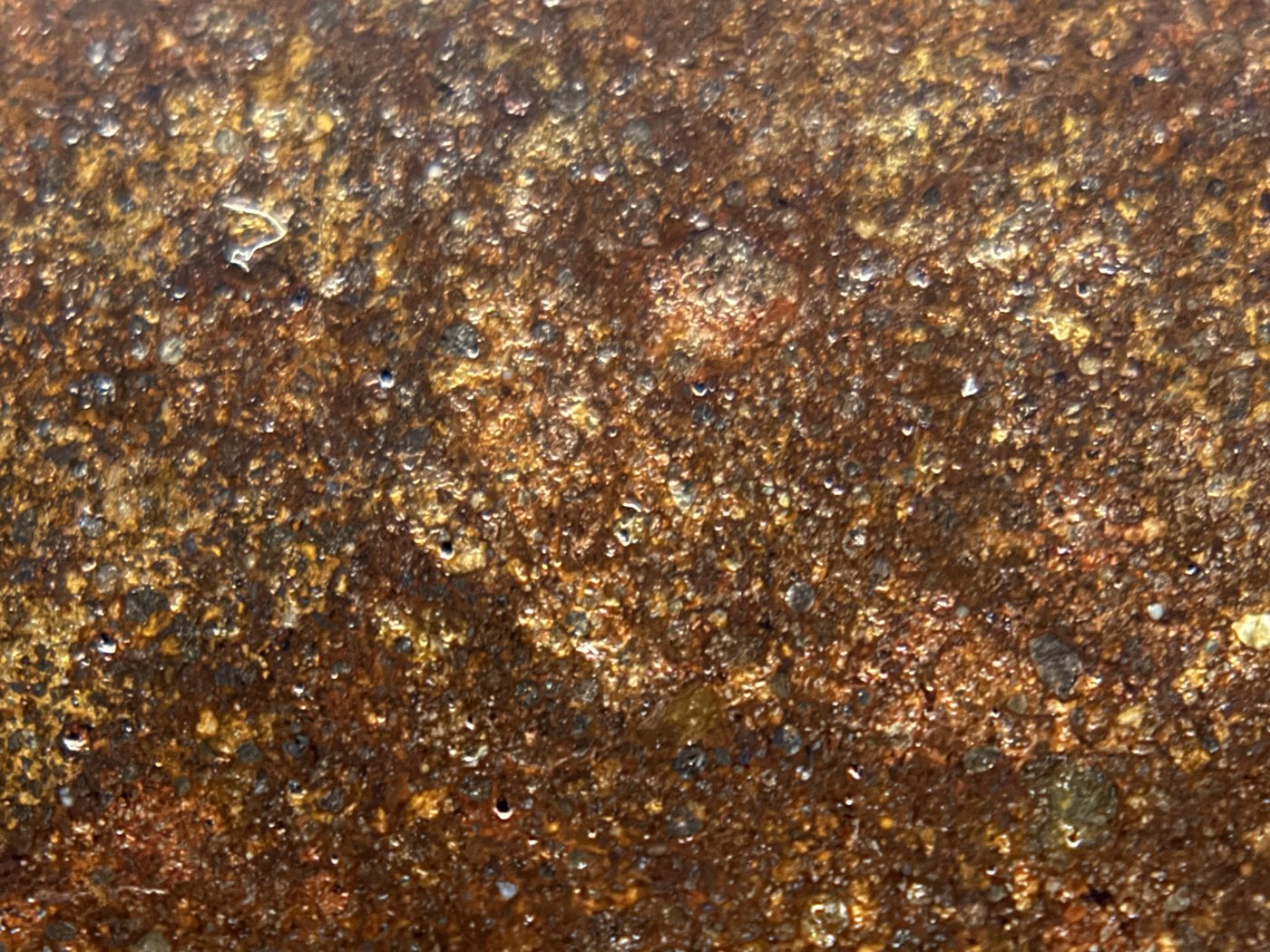 Macro view of NWA 17916 CO3 carbonaceous chondrite meteorite showing closely spaced rounded chondrules on the polished face, 11.28g