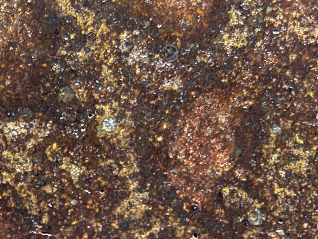 Macro detail of NWA 17916 CO3 carbonaceous chondrite meteorite showing individual chondrules in grey and olive against the matrix, 12.00g
