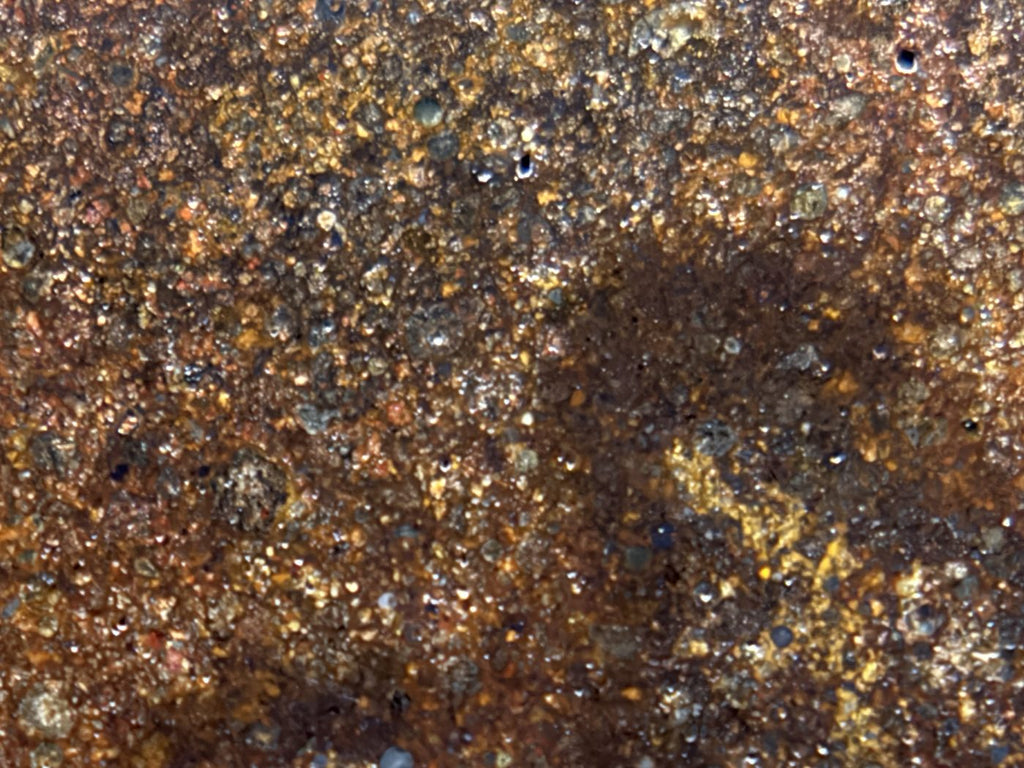 Macro view of NWA 17916 CO3 carbonaceous chondrite meteorite showing closely spaced rounded chondrules on the polished face, 12.00g