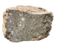 Close view of NWA 17918 Diogenite-pm meteorite showing the cut face and weathered rim, 123.55g