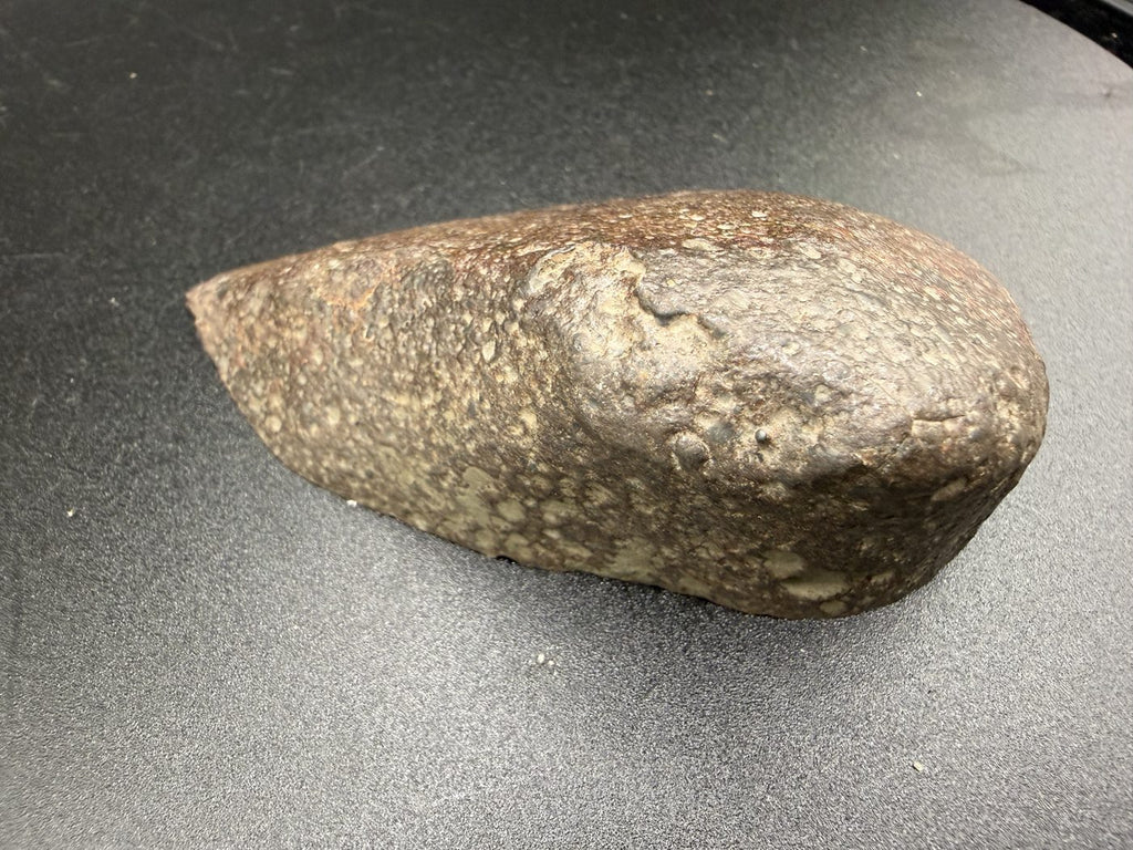 exterior-weathered-surface: Weathered desert exterior of NWA 18205 H3 ordinary chondrite