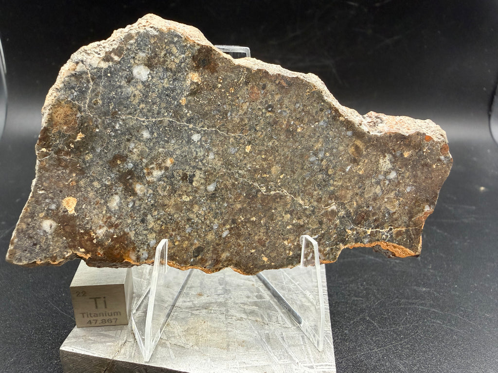 Second view of NWA 18452 eucrite breccia meteorite slice weighing 33.79 grams