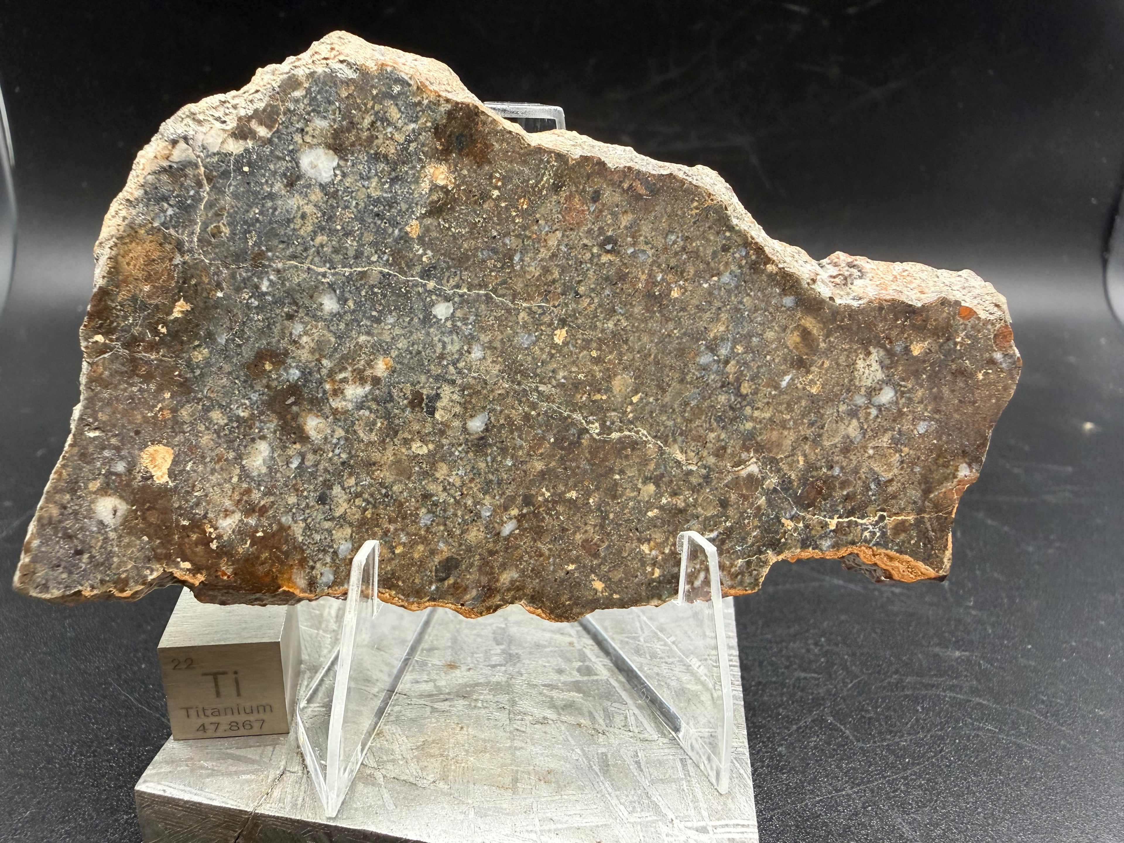 Second view of NWA 18452 eucrite breccia meteorite slice weighing 33.79 grams