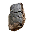 NWA 18501 LL6 ordinary chondrite, slightly oriented complete individual on white, with fusion crust and regmaglypts, 6183g.