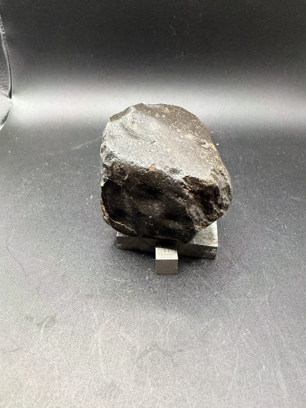 Regmaglypt face of the complete individual, NWA XXX unclassified ordinary chondrite, 392.28g