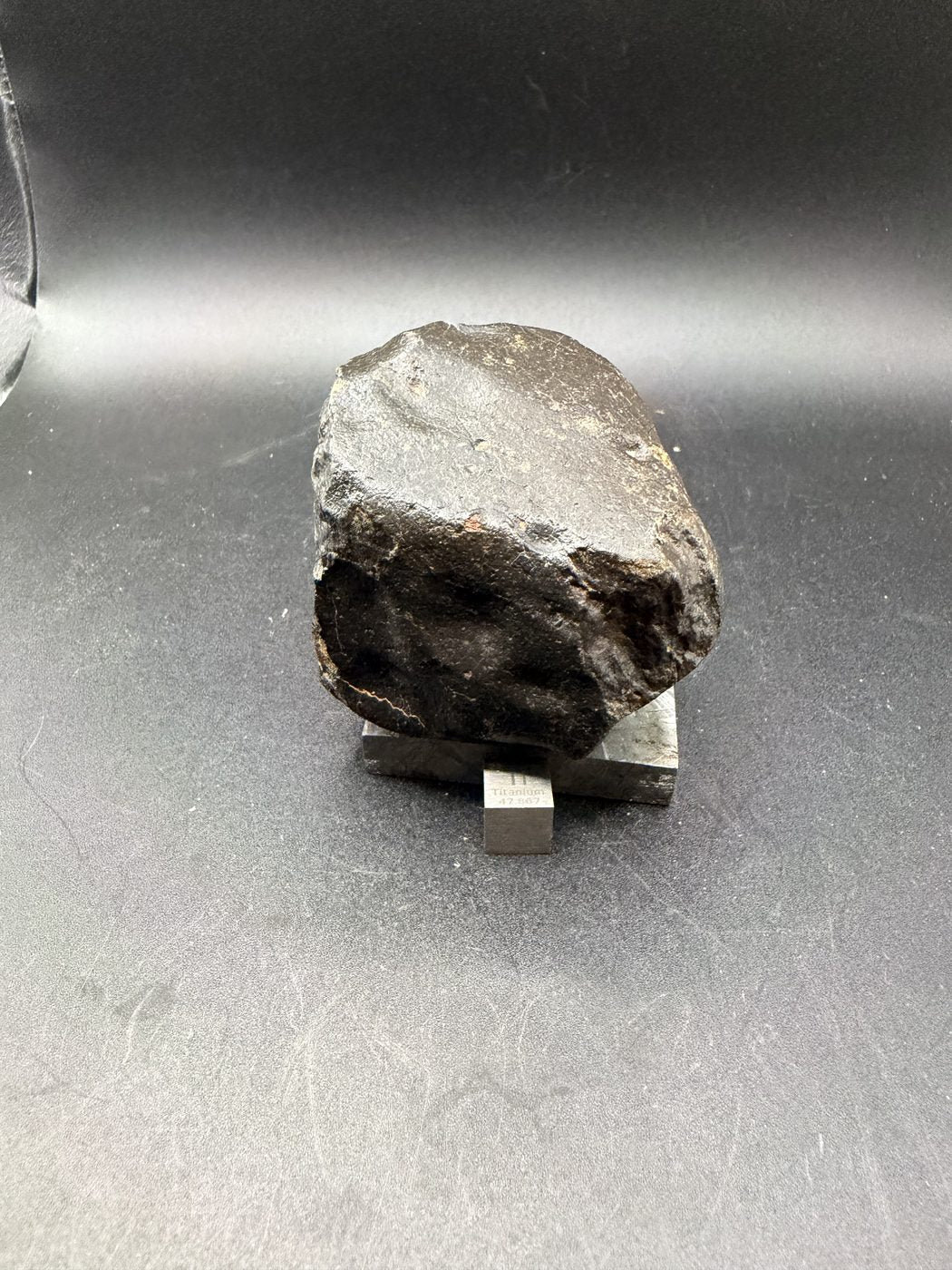 Regmaglypt face of the complete individual, NWA XXX unclassified ordinary chondrite, 392.28g