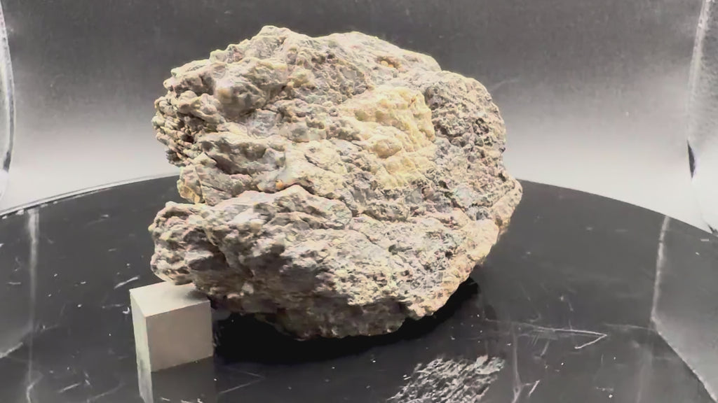 Rotating video of the 193.73g Laâyoune 002 lunar feldspathic breccia individual showing the full exterior and clasts