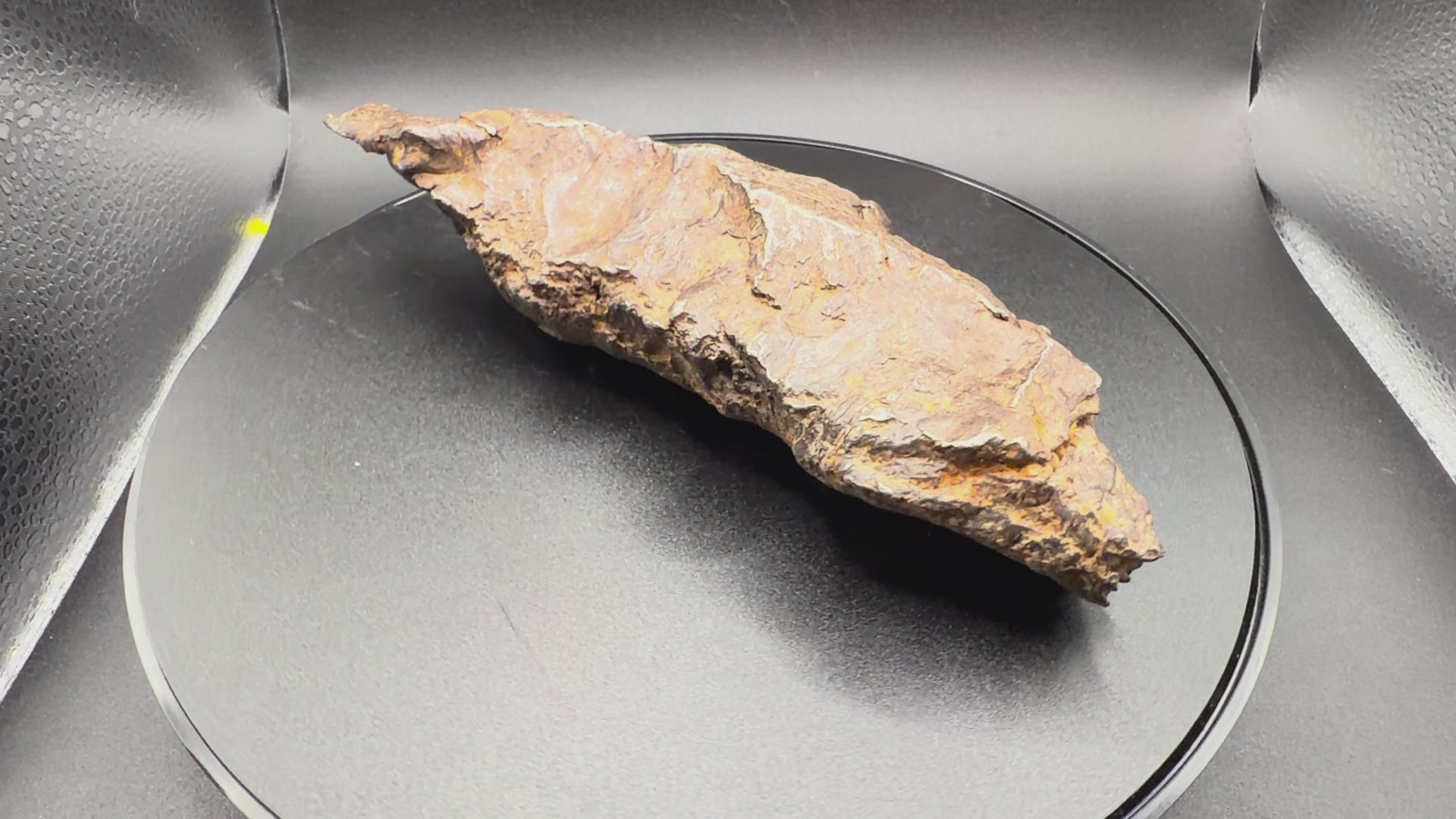 Rotating video of the Gebel Kamil 1414g iron meteorite showing all sides of the whole shrapnel individual