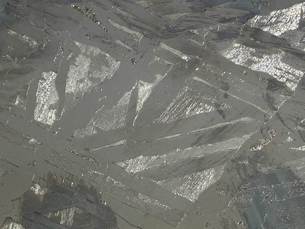 Seymchan pallasite 591g full slice extreme close-up of etched Widmanstätten kamacite and taenite band structure