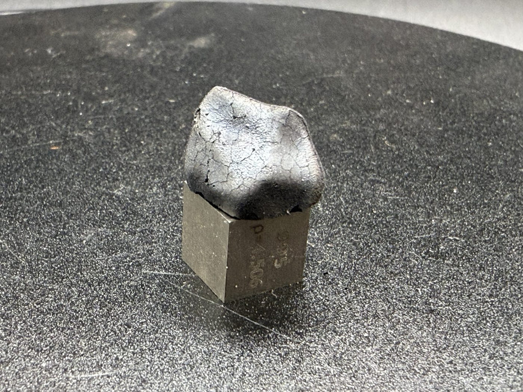 arda C2-ungrouped carbonaceous chondrite, 2.03g, macro of crackled fresh fusion crust