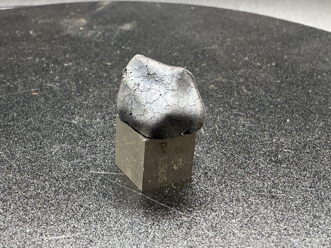 arda C2-ungrouped carbonaceous chondrite, 2.03g, macro of crackled fresh fusion crust